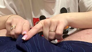 A lovers’ scene that depicts a girl massaging her boyfriend’s genitals through his panties, that makes her have an orgasm