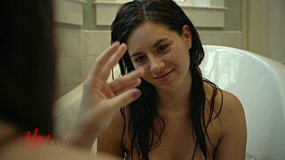 Hot brunette teen gets wet in pool in lesbian scene
