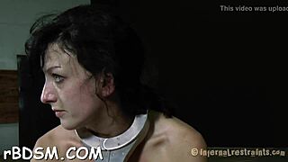 A BDSM playgirl is punished while handcuffed and wearing a collar