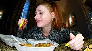 Close up of a hot European couple having oral sex while dressed