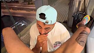 A hot Arab man gives a blowjob to a big cock on the balcony